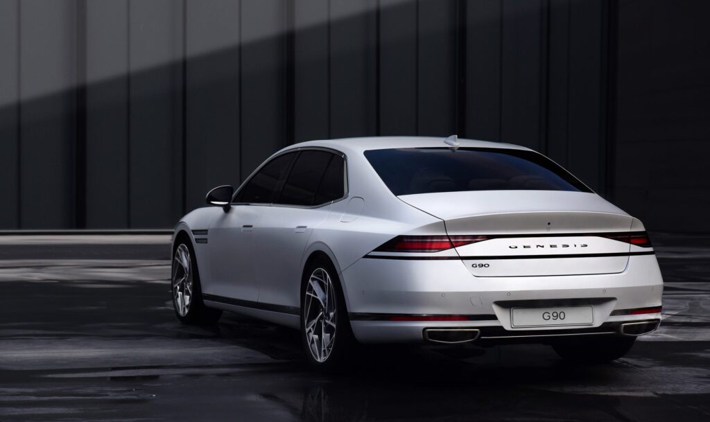 Rear view of a 2023 white Genesis G90