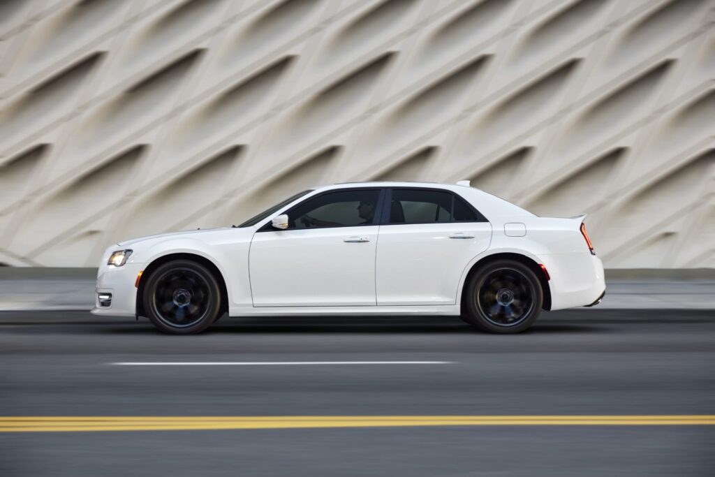 Side angle of a 2023 white Chrysler 300