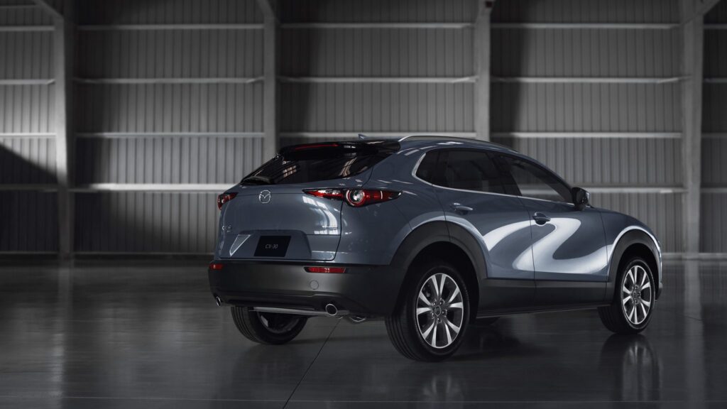 Three-quarter rear view of a 2023 gray Mazda CX-30